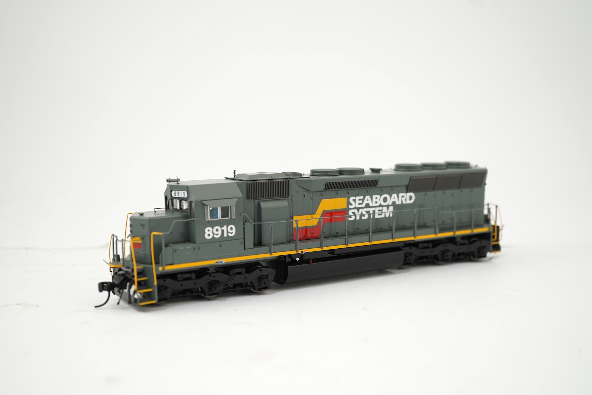A boxed HO gauge Walthers Proto American outline Seaboard System Co-Co diesel locomotive, 8919, (920-48065).